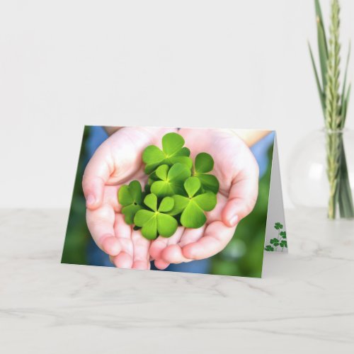 St Patricks Day Four_Leaf Clovers In Hand Holiday Card