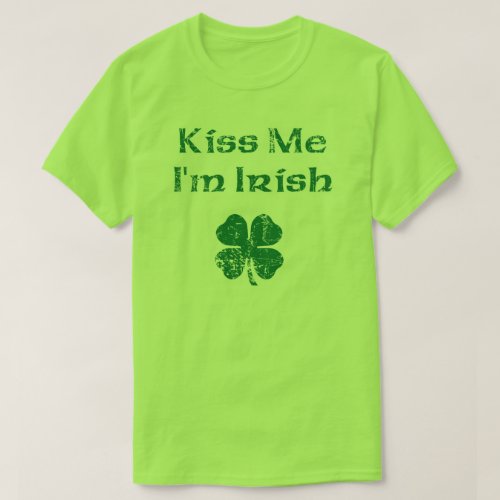 St. Patrick's Day Kiss Me T-Shirt - The luck of the Irish just in time for St. Patrick's Day. Available in all colors and styles. Green shamrock ST Paddys Day distressed design t-shirt