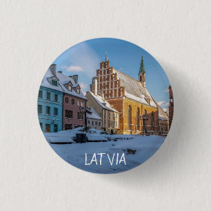 St. Peter's Church in winter in Riga, Latvia Button