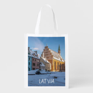 St. Peter's Church in winter in Riga, Latvia Grocery Bag