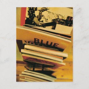 Stack of books and magazines postcard