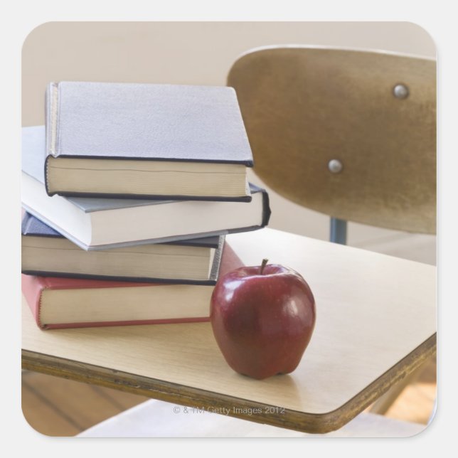 Stack of books, apple, and school desk square sticker (Front)