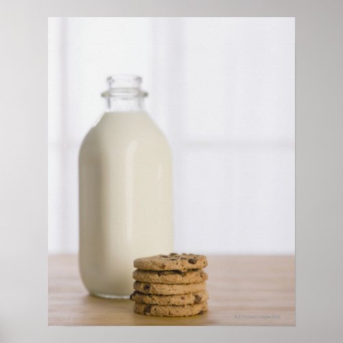 Stack of chocolate chip cookies milk in a glass poster