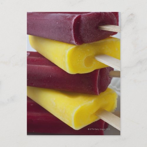 Stack of frozen ice pops ice cream on a stick postcard