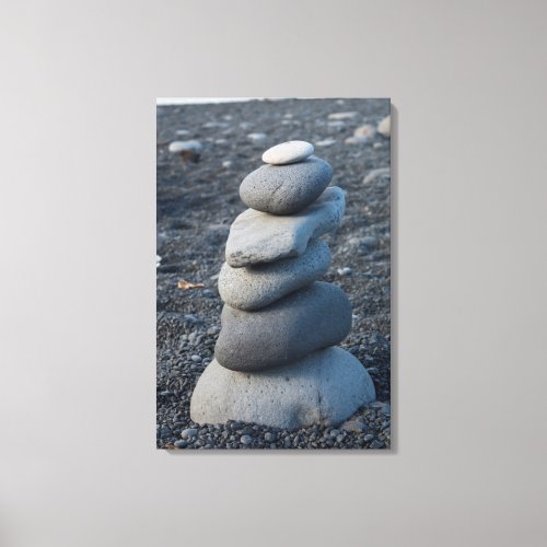 Stack Of Grey Rocks On Beach Canvas Print