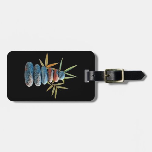 Stacked zen stones in balance with bamboo leaves  luggage tag