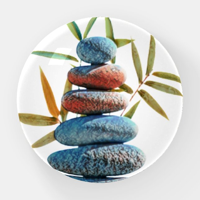 Stacked zen stones in balance with bamboo leaves.  paperweight (Front)