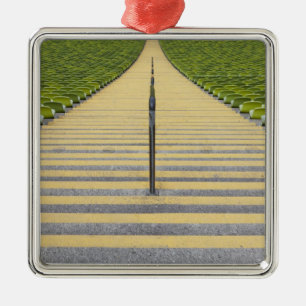 Stadium stairway between rows of green seats metal ornament