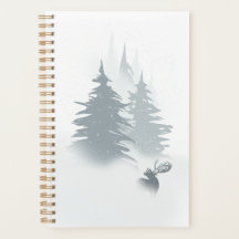 Stag in a snow forest