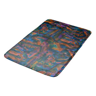 Stained and dented blue shades of aged copper bath mat