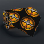 Stained glass dove tie<br><div class="desc">A colourful circular stained glass window from a church in La Celle-Dunoise, France shows a white dove with outstretched wings in front of a red cross with an orange and yellow sunburst and a green border.</div>