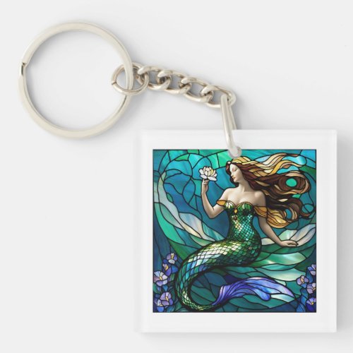 Stained glass mermaid admiring a flower keychain
