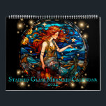 Stained Glass Mermaid Calendar<br><div class="desc">Beautiful stained glass mermaid 2024 calendar features 12 months of stunning artwork featuring mermaids in underwater and seaside settings. Includes depictions of fish,  sea turtles,  and other wildlife. Colorful,  classic,  vintage feel illustrations of mythical fantasy creatures. Makes a perfect Christmas gift for those into the mermaidcore aesthetic.</div>