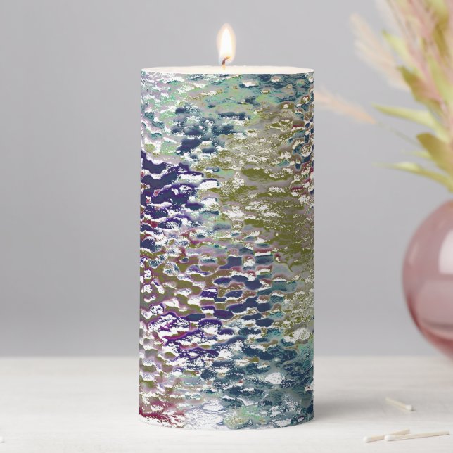 Stains and splatters of paint under hammered glass pillar candle (In Situ)