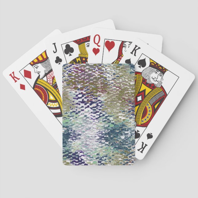 Stains and splatters of paint under hammered glass poker cards (Back)