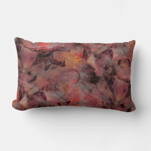 Stains in red hues on black grey grainy background lumbar pillow