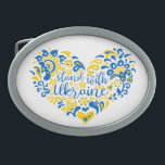 Stand with Ukraine lettering and heart Belt Buckle<br><div class="desc">Stand with Ukraine lettering and heart in Ukrainian flag colors and transparent ethnical pattern Folk art illustration heart and lettering in Ukrainian flag colors and ethnical pattern heart, shape, Purity, Allegory, peace sign, peace symbol, peace, no war, stop war, antiwar, Ukraine, Ukrainian, ethnical pattern, Ukrainian flag, blue and yellow, proud,...</div>