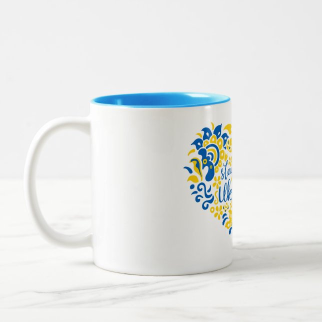 Stand with Ukraine lettering and heart Two-Tone Coffee Mug (Left)