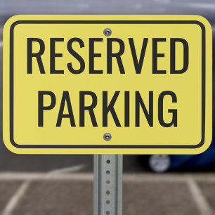 standard black and yellow reserved parking simple metal sign