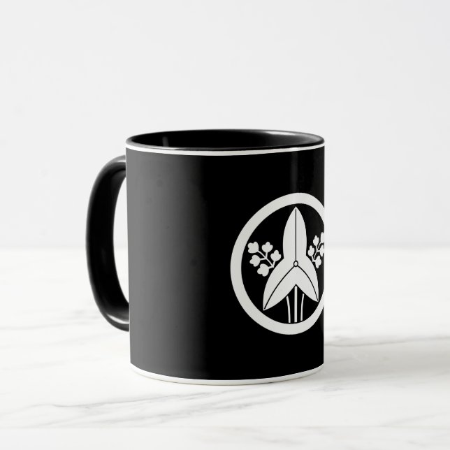 Standing arrowhead in a circle coffee mug (Front Left)