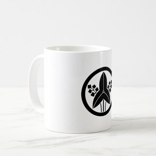 Standing arrowhead in a circle coffee mug (Front Left)