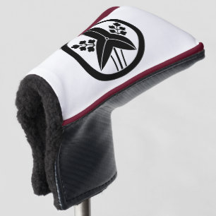 Standing arrowhead in a circle golf head cover