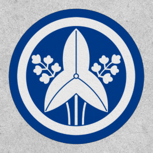 Standing arrowhead in a circle patch