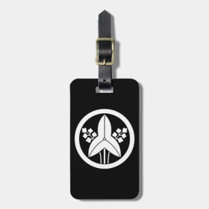 Standing arrowhead in circle luggage tag