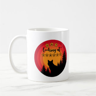 standing black cat looks at sunset coffee mug