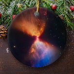 Star Birth, James Webb Space Telescope Christmas Ceramic Ornament<br><div class="desc">This beautiful new infrared visual shows protostar L1527 as it is gathering material from nearby clouds to feed its growth. This photograph was taken by the James Webb Space Telescope Near-Infrared Camera (NIRCam). The protostellar phase is one of the earliest phases of stellar evolution. This star is in its earliest...</div>