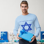 Star of David 1<br><div class="desc">Basic blue long-sleeve t-shirt with an image of a royal blue Star of David and a top and bottom royal blue double border. See the entire Hanukkah Apparel collection in the HOLIDAYS section.</div>