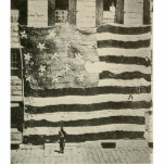 Star Spangled Banner: American Flag on Display Cutout<br><div class="desc">The crowd pressed forward, their eyes drawn to the colossal flag stretched taut against the side of the building. It was a sight to behold, its immense size dwarfing even the largest figures in the crowd. The faded stripes and stars, once vibrant, now bore the marks of time and battle....</div>