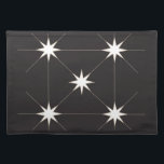 Star Tile Cloth Placemat<br><div class="desc">The front of these placemats have vibrant stars printed on a dark charcoal background. The back is natural linen.</div>