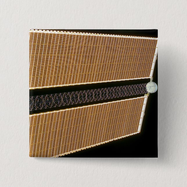 Starboard solar array wing panel pinback button (Front)