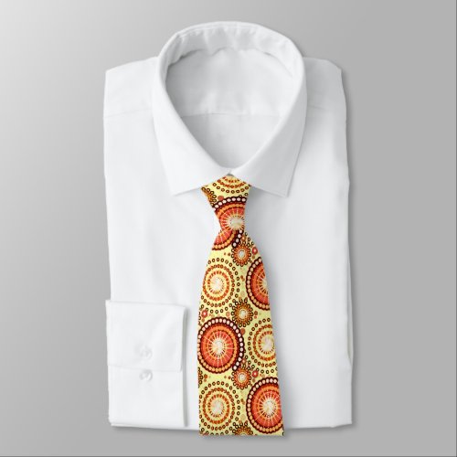 Starbursts and pinwheels brown and yellow neck tie