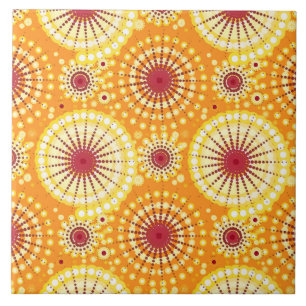 Starbursts and pinwheels, saffron and raisin ceramic tile