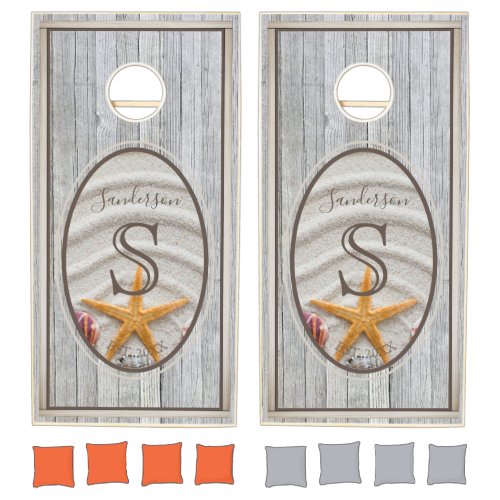 Starfish and Sand Oval on Gray Weathered Wood Cornhole Set