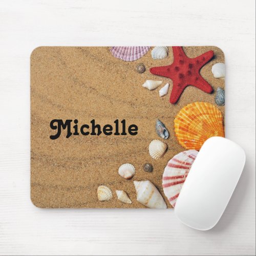 Starfish and seashells on brown beach sand mouse pad