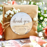 Starfish and Shells Beach Wedding Thank You Classic Round Sticker<br><div class="desc">Stop stressing your wedding thank you stickers - explore the delicate charm of our Starfish and Shells Beach Wedding Thank You Sticker, designed with love by Mylini Design. These easily personalizable stickers add an elegant touch to your wedding, encapsulating the joyful spirit of your special day. Each sticker merges elegance...</div>