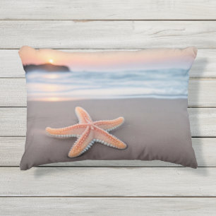 Starfish Lying on a Beach Outdoor Pillow
