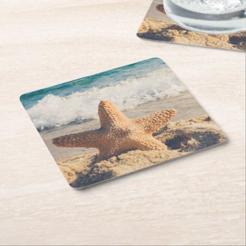 Starfish on a Sandy Beach Photograph Square Paper Coaster
