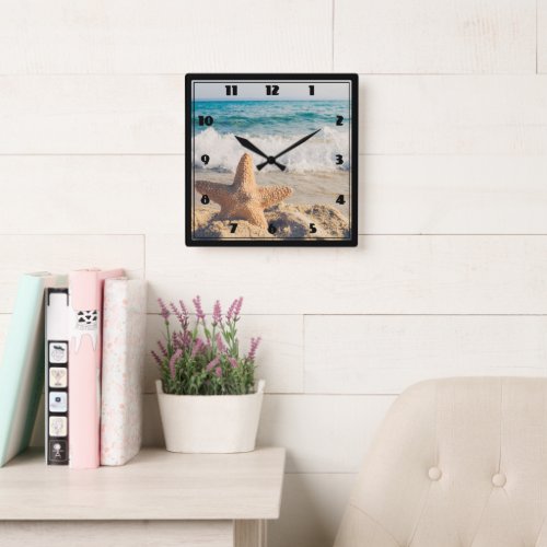 Starfish on a Sandy Beach Photograph Square Wall Clock