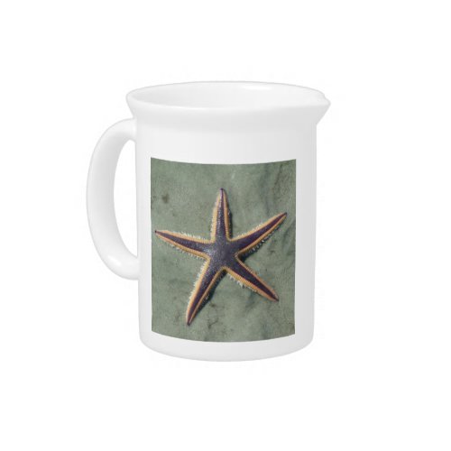 Starfish Purple sea star on beach Drink Pitcher