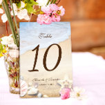 Starfish Tropical Beach Wedding Table Number<br><div class="desc">Set the perfect tropical ambiance for your wedding with our unique Custom Starfish and Shells Tropical Beach Wedding Table Numbers. Elegantly designed with love by Mylini Design, each table number exudes a fresh ocean vibe. The design features a charming starfish resting on a sandy beach, perfectly capturing the serenity and...</div>