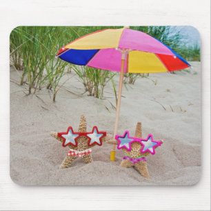 starfish under umbrella on beach mouse pad