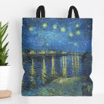 Starry Night Over the Rhône | Vincent van Gogh Tote Bag<br><div class="desc">Starry Night Over the Rhône (1888) by Vincent van Gogh is a mesmerizing Post-Impressionist painting that captures a serene nighttime view of the Rhône River in Arles, France. The artwork features a deep blue sky adorned with shimmering golden stars and their reflections on the water. In the foreground, two figures...</div>