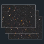 Starry universe deep space photo wrapping paper sheets<br><div class="desc">Universe or cosmos space image from a photo of deep space galaxies taken from the Hubble telescope. Surprise your favorite science geek or astronomer.</div>