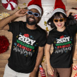 Stars & Snowflakes Santa Hat Year Family Christmas T-Shirt<br><div class="desc">Graphic family Christmas t-shirt in white personalized with the year and your family name, with a santa hat perched on the zero and your family name in bold green letters, surrounded by stars and snowflakes. Graphic t-shirt for spending Christmas with the family, all in matching t-shirts, with your family name...</div>