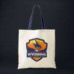 State Pride | Wyoming Tote Bag<br><div class="desc">Anderson Design Group is an award-winning illustration and design firm in Nashville,  Tennessee. Founder Joel Anderson directs a team of talented artists to create original poster art that looks like classic vintage advertising prints from the 1920s to the 1960s.</div>