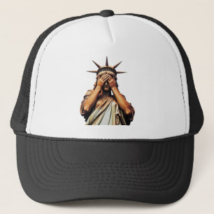 Statue of Liberty covering her face in shame Trucker Hat